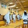 Graduates continued the traditional hat toss after being declared “2020 Graduates of Fulton County High School” May 29 in the gymnasium of the school. There were 36 graduates honored during the night, with family in attendance. (Photo by Barbara Atwill)