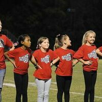 GO BIG RED – South Fulton elementary students who participate in the Youth League Football and Cheerleading program were honored during halftime at the SFHS vs. Dresden football game. Sept. 23 (Photo by David Fuzzell)