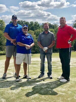 SUITED TO A TEE – Premier Portable Buildings, with team members Tim Franklin, Michael Franklin, Greg Hodges and Michael Don Burnette, took second place in the Twin Cities Chamber Annual Golf Tournament at Fulton Country Club on Friday. (Photo submitted)