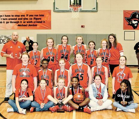 STATE BOUND – South Fulton Middle School Lady Devils and Coaches Jeremy McFarland and Leah McFarland, featured in the Feb. 12 edition of The Current, captured a sectional crown Feb. 10, advancing to the Tennessee Middle School Athletic Association State Class A Tournament.