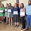 Pictured are Kiwanis Club of the Twin Cities award recipients, from left, event speaker, Austin Norton, Brandi Cantrell, Olivia Fulcher, Addison Stubblefield, Rebecca Copeland, Anna and Chris Powell.