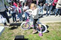 WINNING TICKET HOLDER WINS BIKE -- Nora Kate Davidson was the winning ticket holder in the ages 4-6 division drawing for a new bike at the April 1 Community Easter Egg Hunt at the South Fulton Municipal Complex. Kailan Nesbitt, not pictured, won the bike in the boys', ages 4-6 drawing.  (Photo by Benita Fuzzell.)