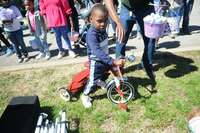EGG HUNT TRIKE WINNER -- Tyree Bolton had his ticket drawn to win a new tricycle in the birth to 3-year old category, at the Community Egg Hunt sponsored by the South Fulton Parks and Rec Board April 1. (Photo by Benita Fuzzell.)