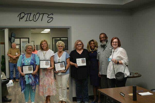 STAFF PERFECT ATTENDANCE - Fulton County Superintendent Patrice Chambers, and Board Chairman Perry Turner, recognized Fulton County staff for perfect attendance for the past year. Pictured from left are Jennifer Davis, Ellen Murphy, Deena Anderson, Donna Bridges, Chambers, Turner, and Julie Jackson. (Photo by Barbara Atwill)