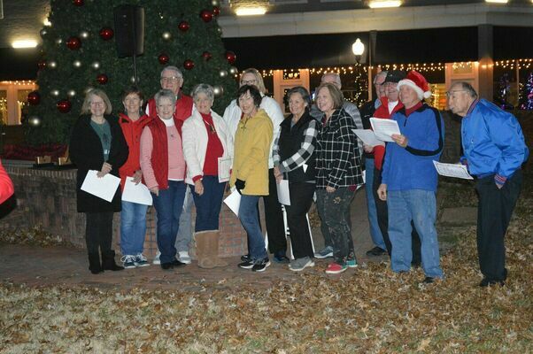 SOUNDS OF THE SEASON - Members of Fulton's First United Methodist Church entertained the crowd at Christmas in the Park on Dec. 4. Fulton Tourism sponsored the event at Pontotoc Park. (Photo by Barbara Atwill)