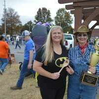 South Fulton City Manager Joyce Gray was the first place winner in the South Fulton Parks and Recreation Board's first chili cookoff, held in conjunction with the Twin Cities Parks Boards' annual Trunk or Treat Fall Halloween Festival event Oct. 29. Lynnita Pierce, a member of the South Futon Parks and Rec Board made the presentation. (Photo by Benita Fuzzell.)