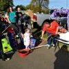SAFE DELIVERY – Lisa Bradley uses an old “Hot Wheels” track to safely deliver treats to youngsters attending Cayce Baptist Church’s Trunk or Treat Halloween night. Several vehicles were decorated for the little ones to come and receive treats. (Photo by Barbara Atwill)