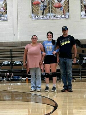 SENIOR NIGHT HONORS – Fulton County High School Senior Volleyball player, Aubrey Allison, center, was honored during Senior Night Honors on Oct. 10. (Photo submitted).