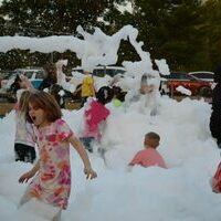 FOAM PARTY - Hickman Pecan Festival attendees of all ages enjoyed the Foam Party set up on Oct. 22 at Jeff Green Memorial Park. (Photo by Barbara Atwill)