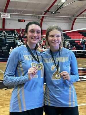 Fulton County High School Lady Pilots volleyball team members Hannah Emmons, left, and Kylee Harrison, right, were selected First District All-District Team following the conclusion of their championship game against the Carlisle County Lady Comets Oct. 18. (Photo submitted)