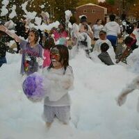 PECAN FESTIVAL FOAMY FUN – One of the final activities for the children attending the Hickman Pecan Festival Oct. 22 was the Foam Party, which drew a large group of young people into the puffy playground. (Photo by Barbara Atwill)