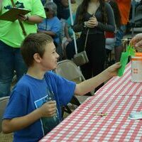 ONLY CONTESTANT - Arlen Simmons was the only entry in the eleven to twelve age division of the Pie Eating Contest at the Hickman Pecan Festival held Oct. 22 at Jeff Green Memorial Park in Hickman. (Photo by Barbara Atwill)