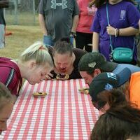 ADULT PIE EATING CONTEST - Adults participated in the Pie Eating Contest at the Hickman Pecan Festival held Oct. 22 at Jeff Green Memorial Park in Hickman. (Photo by Barbara Atwill)
