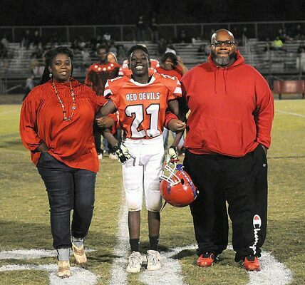 SFMS FOOTBALL RED DEVIL EIGHTH GRADERS HONORED –  Trevor Stunson, along with his parents, was among South Fulton Middle School eighth grade football players recognized Sept. 29 for Eighth Grade Night honors. (Photo by David Fuzzell)