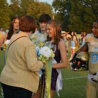 CROWNING MOMENT - Rhiannon Eakes was crowned the 2022 Football Homecoming Queen on Sept. 16 at Sanger Field. Jakyla Crumble, 2021 Football Homecoming Queen was at school at the University of Kentucky and couldn't attend the game. Julie Jackson, Athletic Director, crowed Eakes. (Photo by Barbara Atwill)