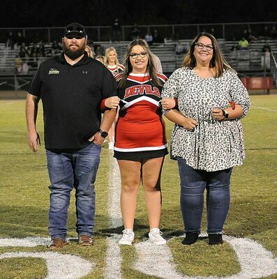 SOUTH FULTON CHEERLEADERS HONORED FOR MIDDLE SCHOOL EIGHTH GRADE NIGHT – Lexie Martin and her parents were recognized Sept. 29 during the South Fulton Middle School Red Devils football game against Dresden, when Eighth Grade Night Recognition was staged. (Photo by David Fuzzell)