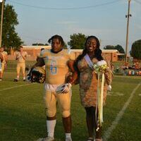 SENIOR COURT - Jaylia Kinney, Senior at Fulton County High School, represented her class during Homecoming Sept. 16. She was escorted by JShon Jones. (Photo by Barbara Atwill)