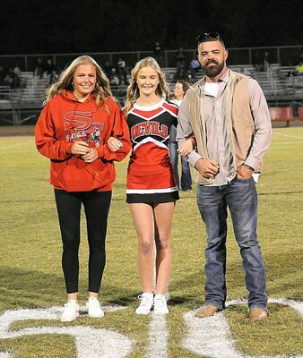 EIGHTH GRADE RED DEVIL CHEERLEADERS RECOGNIZED – Jayla Jones, SFMS cheerleader, was recognized along with her parents, during Eighth Grade Night Sept. 29. Eighth grade student athletes were honored during the SFMS-Dresden football game. (Photo by David Fuzzell)