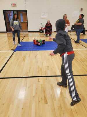 RING TOSS - A student at Fulton County Elementary School participated in one of the games set up at the Fulton County Elementary School's PTSO Fall Festival held Nov. 12. (Photo submitted)