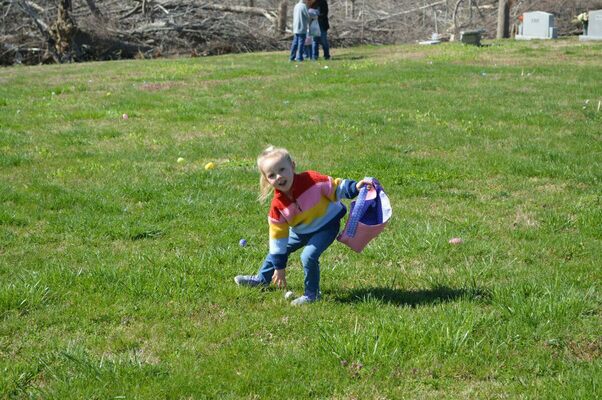 ALL SMILES - Heidi Burnette is all smiles as she hunts for Easter eggs at Cayce United Methodist Church's annual Easter egg Hunt on April 9. (Photo by Barbara Atwill)